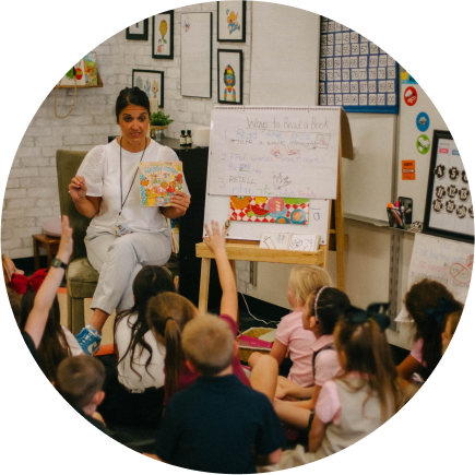teacher in her classroom teaching students