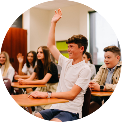 student raising his hand